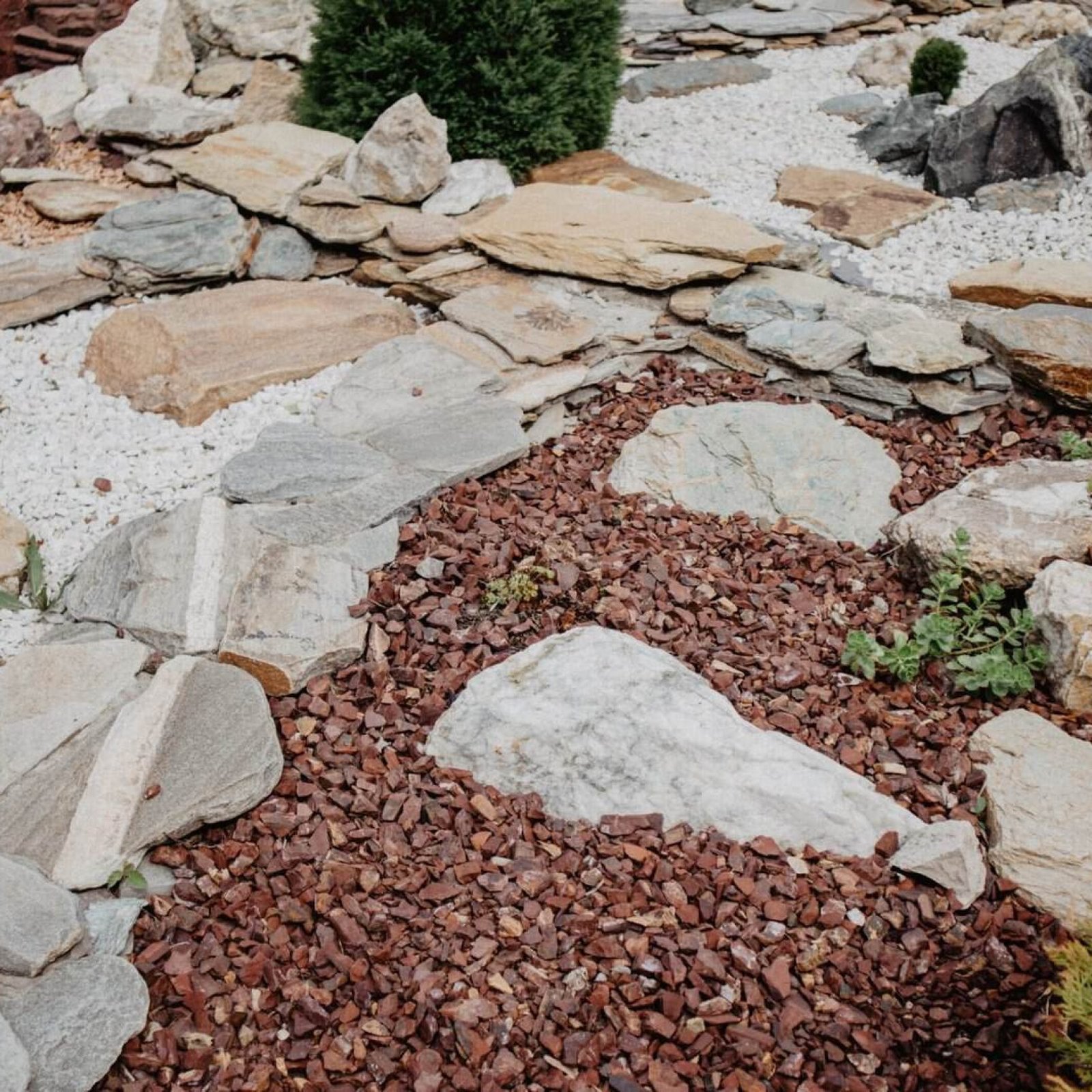 Landscape rocks and mulch for garden design by JS CALI General Construction.